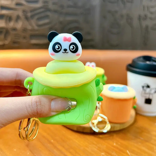Tree Stump Animal Squeezing Keychain Pendant